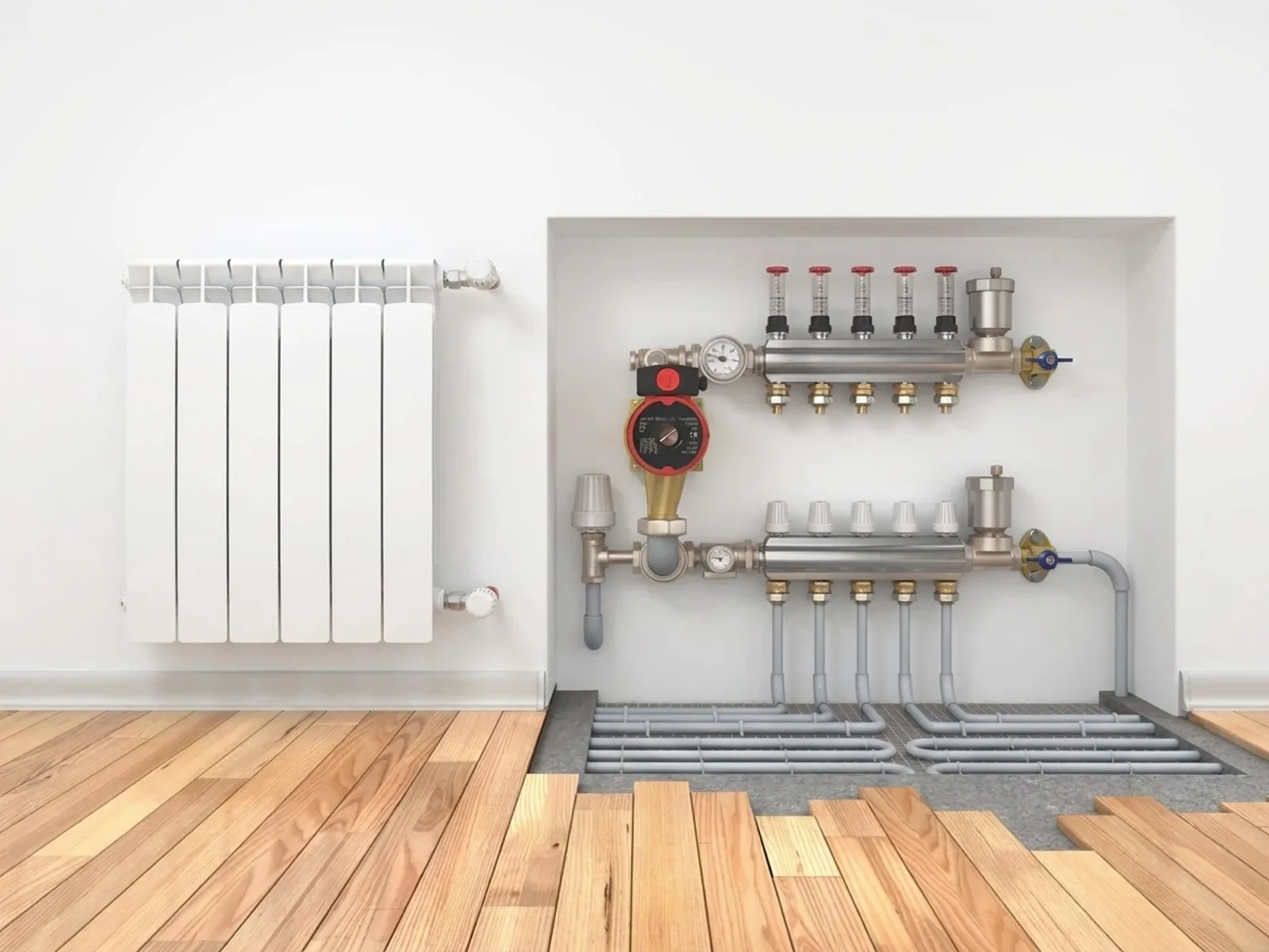 Plancher chauffant hydraulique : collecteur et boucles de tubes, en complément d'un radiateur, alimentés par la pompe à chaleur.